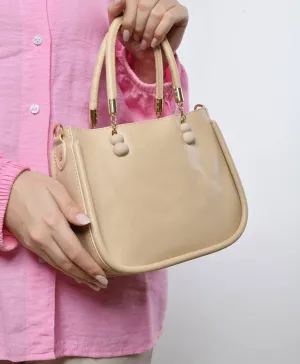 Small beige top-handle bag